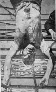 The battered body of Benito Mussolini hung for public view in Milan after partisans shot him in 1945.