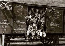 German troops blithley shipped off in cattle carts to the slaughter of the First World War in 1914.