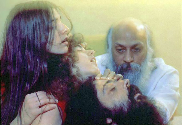 Osho giving energy Darshan.