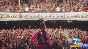 Lead singer of the Eagles of Metal Death with cheering audience just minutes before the attack at the Bataclan.