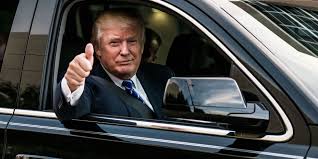 TrumpThumbsUpinCar