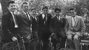 Trump, second from left, and his friends who played sailors in Gilbert and Sullivan's HMS Pinafore production at his middle school. Trump first had aspirations to become a movie actor.