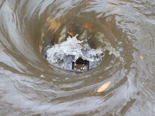 LouisianaFlood-DownTheDrain