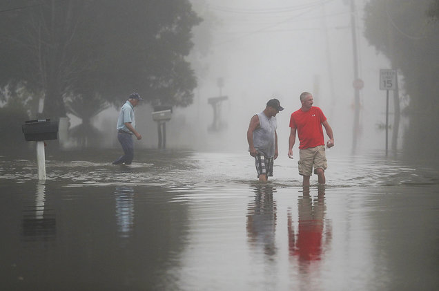 LouisianaFlood-MeninInundatedStreetFoggy