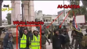 The White Helmets in reality (right) toting guns with terrorists because in fact they are the ER if ISIS!