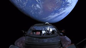 Elon Musk's Tesla Roadster with "Starman" driving in a Space X launch.