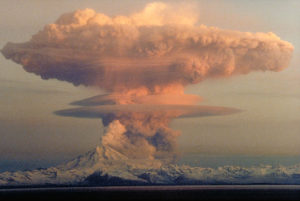 Atomic attack on Mt. Redoubt in Alaska in 1970? No. Tis' a mixed metaphor for our mixed up future where two threats may extinguish the human race: carbon released by humans added to natural releases such as volcanic eruptions as one example, lead to global warming. Compared to what the earth releases each year it is quite small, but it is like the straw that broke the back of the climate's balancing act. That this eruption forms an almost perfect hydrogen bomb mushroom alludes to the other threat to human existence. At no time, even in the last Cold War are we moving so perilously close to a thermonuclear war than now, so says my Oracle.