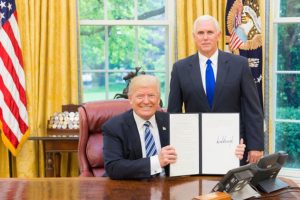 Trump’s successor? Vice President Pence, standing.