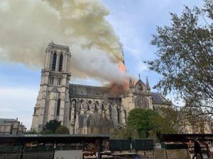 Notre Dame on fire in the initial stages of the blaze. Source: Wandrille de Préville © Wikimedia Commons. 