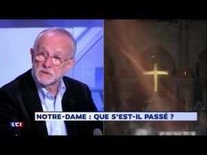 Benjamin Mouton on Pujadas 24Heures, 16 April 2019 with photo of a fireman’s light illuminating the interior of Notre Dame during the peak of the fire.