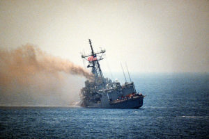 Back to the Future? The missile frigate USS Stark on fire after being hit by two Exocet missiles within 30 seconds, killing 37 US sailors back in 17 May 1987. This was during the last time US and Iranian naval forces actually shot at each other. However, this was a “friendly fire” incident. The Stark was hit by Iraqi missiles by mistake fired from America’s “friendly” dictator and ally, Saddam Hussein at that time. He’s the fellow the US had supplied with the means to make and target chemical weapons gassing 100,000 Iranian soldiers during Saddam Hussein’s invasion of Iran during the Iran-Iraq War (1980-1988).