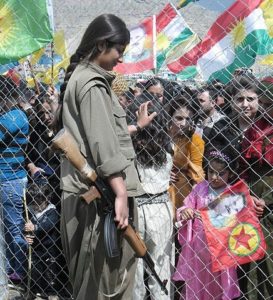 Kurdish woman PKK guerilla at the Newroz celebration in Qandil. © Creative Commons.