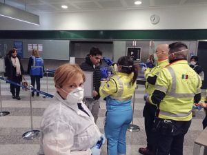 5 February 2020, Italian police and medics screening airline passengers returning from China at Milan’s Malpensa International Airport.