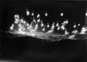 RAF (Royal Air Force) bombers lighting Genoa up with Flares to be “lit up” by bombs.