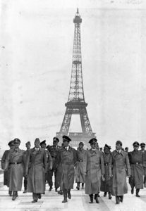 Hitler in Paris, June 1940, taking a victory walk through Paris with his generals and architect Albert Speer. Source: ©Creative Commons. 