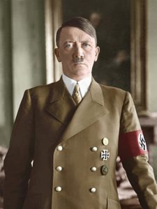 Adolf Hitler, 1938, cropped and colorized from the original: Bundesarchiv, Bild 183-H1216-0500-002 / CC-BY-SA, © Creative Commons. 