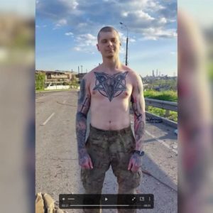 Satanic rendering of the Pagan ass-headed God Baphomet on his chest. It is also on this Nazi soldier’s back. 