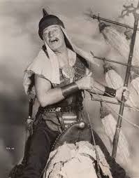 John_Wayne_Genghis_Khan_Fooling_around-SRC-RKO_Pictures-LEFT