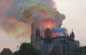 The roof of Notre Dame as perhaps its namesake Nostradamus foresaw it 463 years ago in a vision of "the Dame in the glowing hot coals and wood embers" by night that followed the late afternoon fire that had initially erupted in great columns of fire and smoke to at times completely obscure “Our Lady of Paris” so that she "will no longer be in sight."