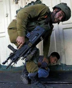 Israeli-soldier-manhandling-Palestinian-Child-West-Bank